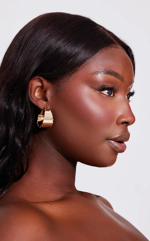 Gold Flared Texture Hoop Earrings sold by Pretty Little Thing