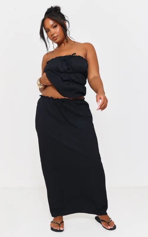 Plus Black Texture Midi Skirt sold by Pretty Little Thing