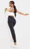 Tall  Black Luxe High Waisted Gym Ruched Bum Leggings sold by Pretty Little Thing