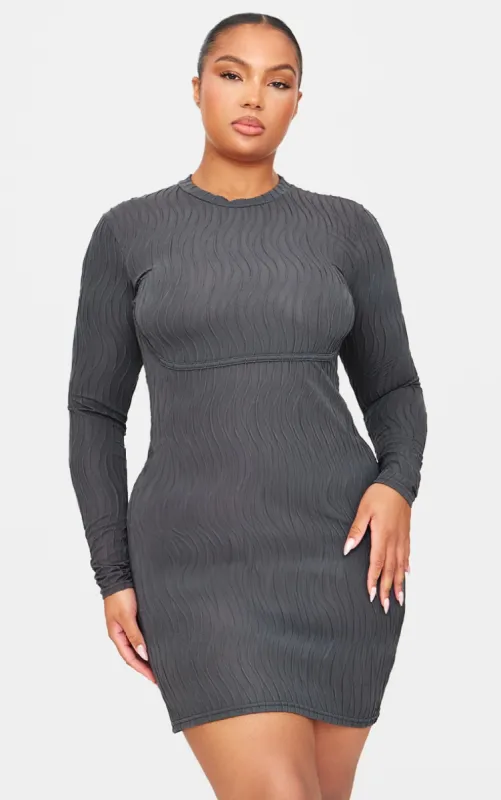 Plus Charcoal Textured Long Sleeve Bust Seam Detail Mini Dress made by Pretty Little Thing