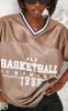  Tall Chocolate Contrast Trim Football Jersey sold by Pretty Little Thing