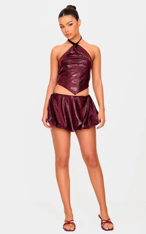 Burgundy Wet Look Croc Print Mini Skirt sold by Pretty Little Thing