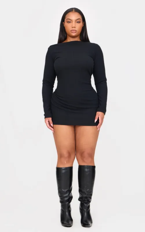 Plus Black Slash Neck Long Sleeve Ribbed Mini Dress made by Pretty Little Thing