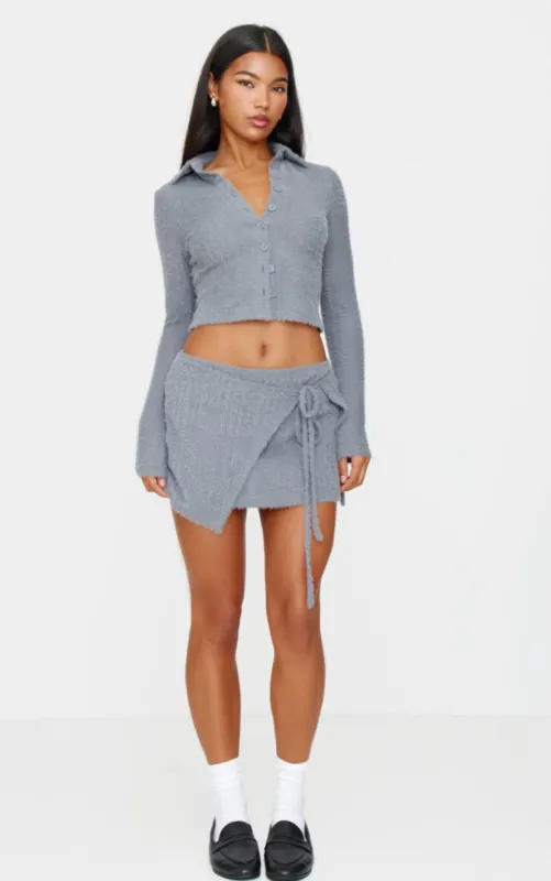 Blue Grey Brushed Texture Pleated Tie Side Mini Skirt sold by Pretty Little Thing