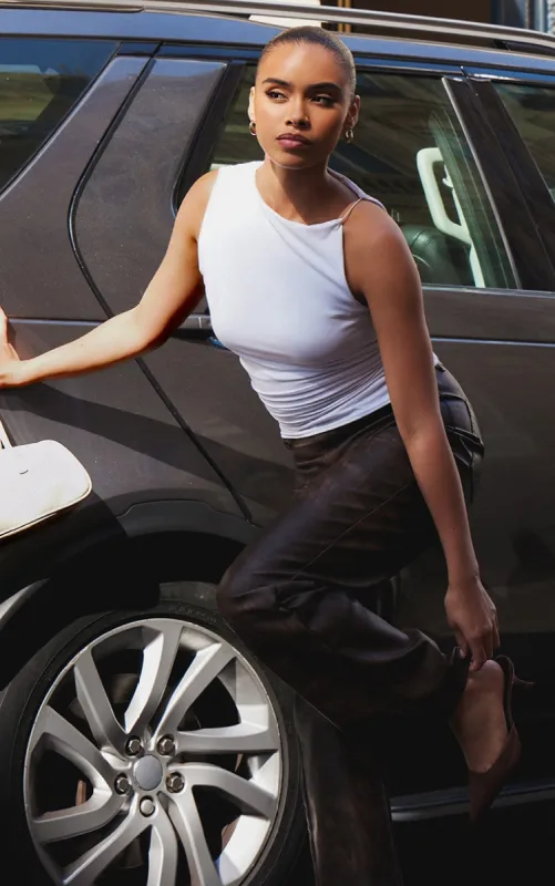 White Slinky Ruched Side Shoulder Detail Top sold by Pretty Little Thing