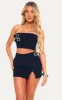 Black Woven Stretch Tailored Bandeau Buckle Top sold by Pretty Little Thing