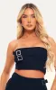 Black Woven Stretch Tailored Bandeau Buckle Top sold by Pretty Little Thing