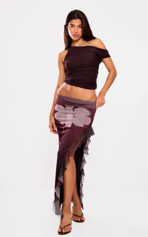 Plum Flower Ruffle Detail Mesh Skirt  sold by Pretty Little Thing