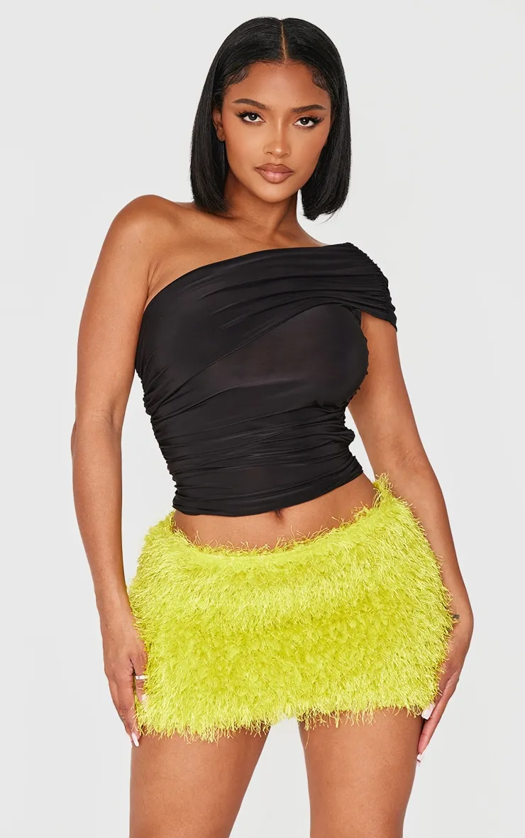 Shape Lime Low Rise Faux Leather Tassle Mini Skirt sold by Pretty Little Thing