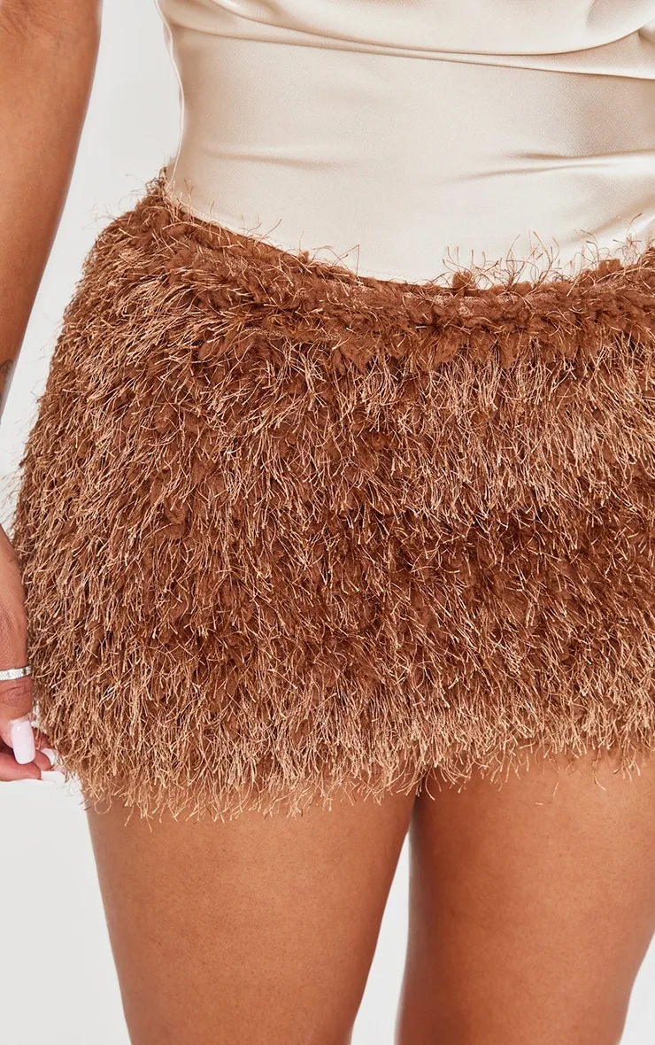 Shape Chocolate Low Rise Faux Leather Tassle Mini Skirt sold by Pretty Little Thing product image thumbnail 5