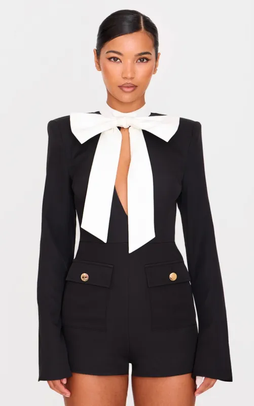 Black Woven Bow Tie Detail Playsuit sold by Pretty Little Thing