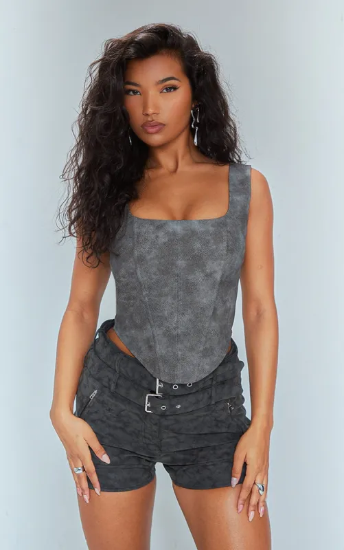 Black Washed Faux Leather Boned Corset sold by Pretty Little Thing