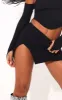 Black Stretch Woven Extreme Split Hem Micro Mini Skirt sold by Pretty Little Thing