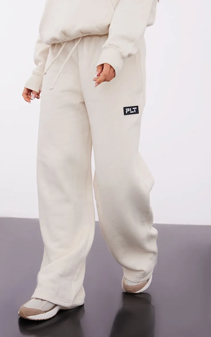 PRETTYLITTLETHING Petite Cream Badge Detail Straight Leg Joggers sold by Pretty Little Thing product image thumbnail 2