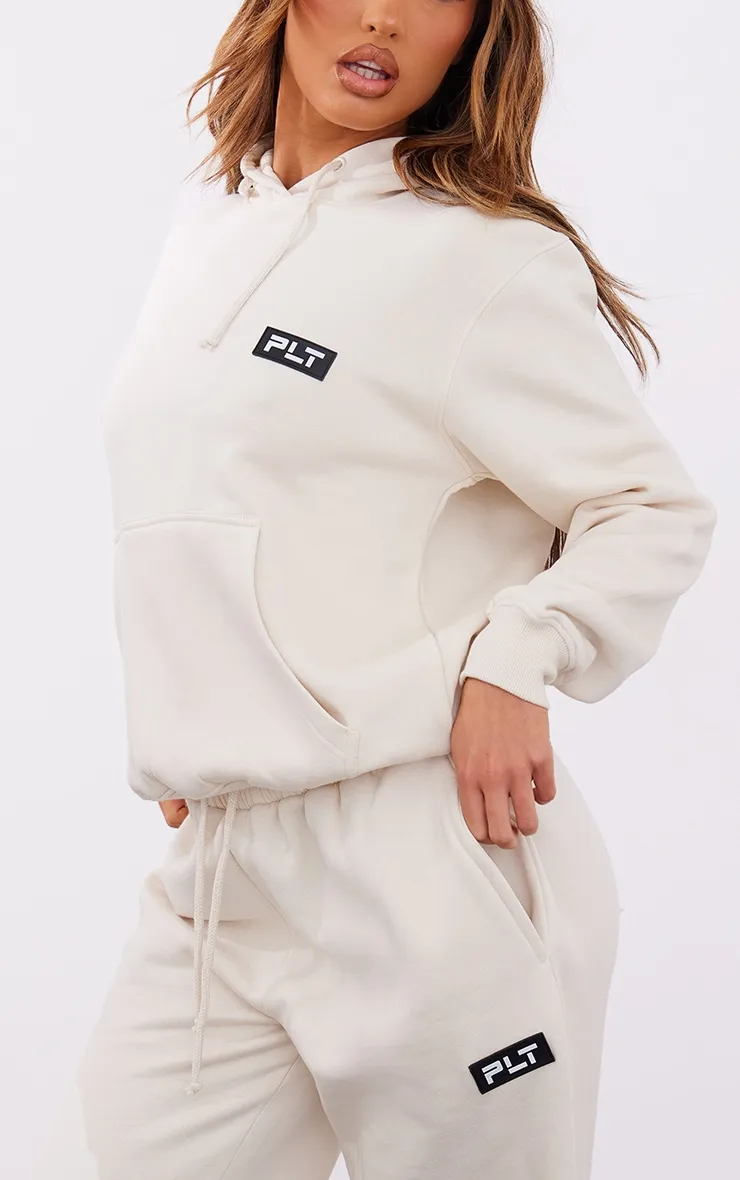 PRETTYLITTLETHING Petite Cream Badge Detail Straight Leg Joggers sold by Pretty Little Thing product image thumbnail 4