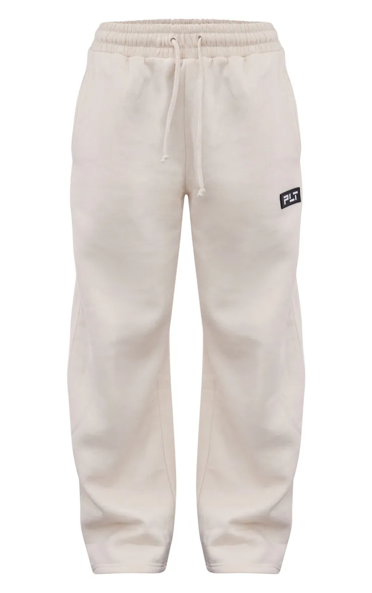 PRETTYLITTLETHING Petite Cream Badge Detail Straight Leg Joggers sold by Pretty Little Thing product image thumbnail 5