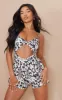 Black Abstract Print Twist Bust Strappy Playsuit sold by Pretty Little Thing
