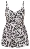 Black Abstract Print Twist Bust Strappy Playsuit sold by Pretty Little Thing