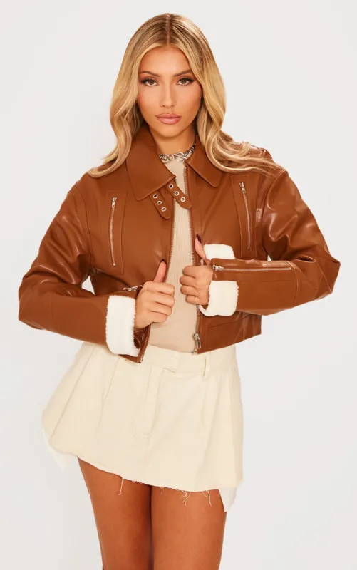 Tan Cropped Zipped Detail Aviator sold by Pretty Little Thing