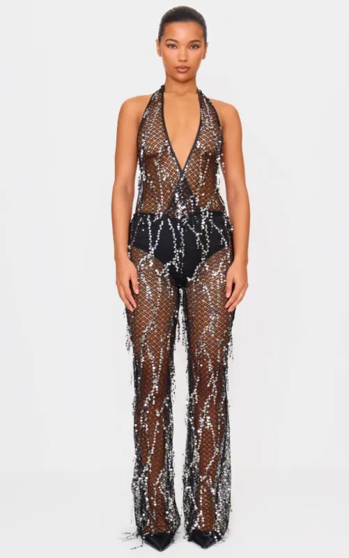 Black Sequin Fishnet Halterneck Jumpsuit sold by Pretty Little Thing