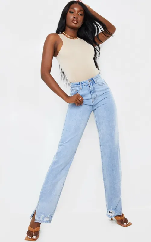 Tall Light Blue Wash Ripped Detail Split Hem Straight Leg Jeans sold by Pretty Little Thing