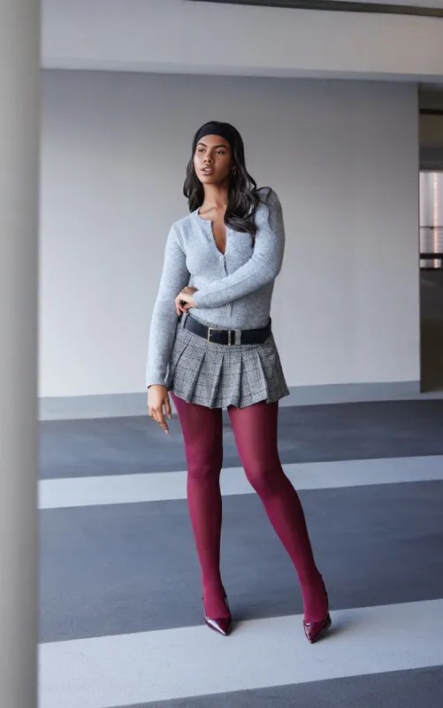 Monochrome Plaid Brushed Woven Belted Pleated Mini Skirt sold by Pretty Little Thing