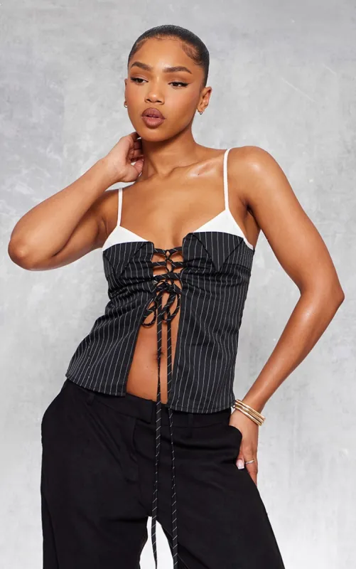 Black Pinstripe Contrast Stap Lace Up Top sold by Pretty Little Thing