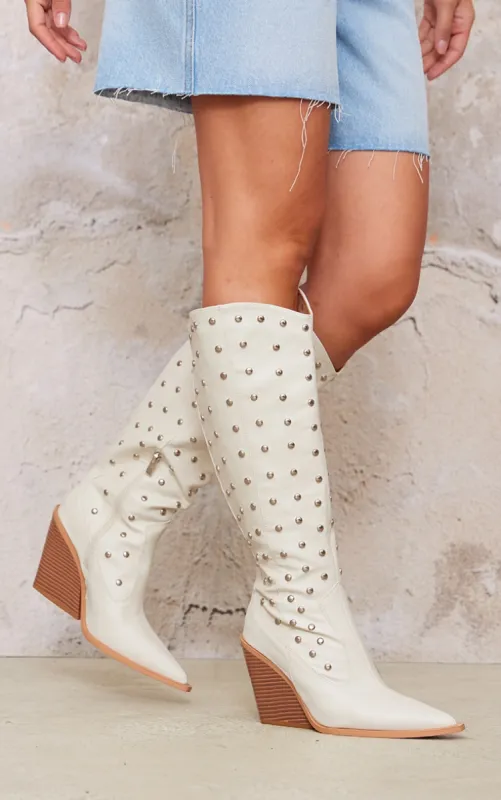 Cream PU Point Toe Silver Stud Knee High Block Heel Western Boots sold by Pretty Little Thing
