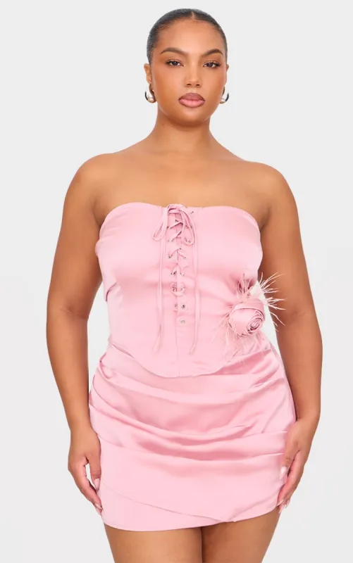 Plus Pink Satin Corset With Corsage Detail sold by Pretty Little Thing