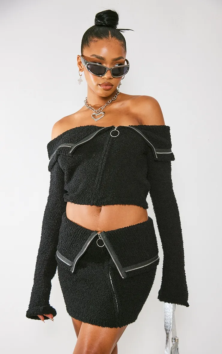Black Fluffy Knit Fold Over Zipped Crop Jacket sold by Pretty Little Thing