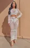Petite Cream Crochet Long Sleeve Crop Top sold by Pretty Little Thing