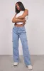  White Basic Ribbed Racer Vest sold by Pretty Little Thing