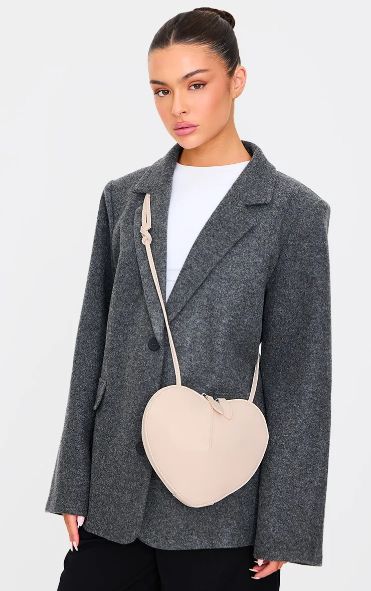 Cream Pu Heart Crossbody Bag sold by Pretty Little Thing