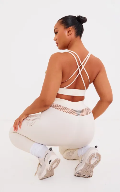 PLT SPORT Plus Bone Seamless Laser Cut Sports Bra sold by Pretty Little Thing