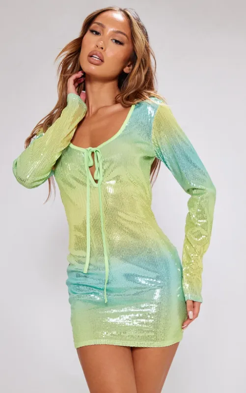 Petite Green Ombre Sequin Long Sleeve Mini Dress sold by Pretty Little Thing