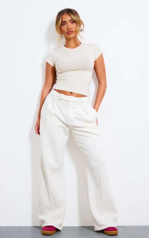 Cream Pintuck Fleeceback Tailored Joggers sold by Pretty Little Thing