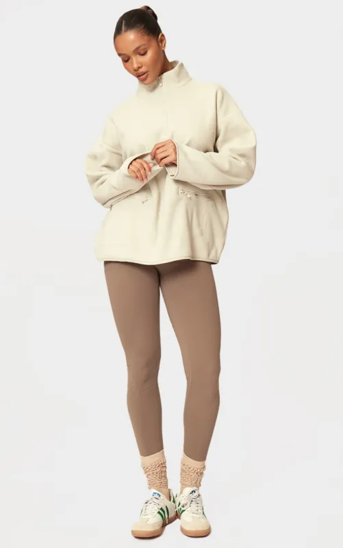 Stone Quarter Zip Fleece Pocket Detail Sweatshirt sold by Pretty Little Thing