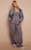 Charcoal Bandeau Corset Wide Leg Jumpsuit sold by Pretty Little Thing
