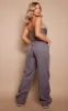 Charcoal Bandeau Corset Wide Leg Jumpsuit sold by Pretty Little Thing