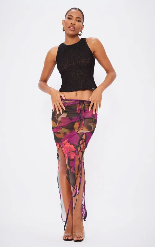 Multi Printed Mesh Asymmetric Hem Maxi Skirt sold by Pretty Little Thing