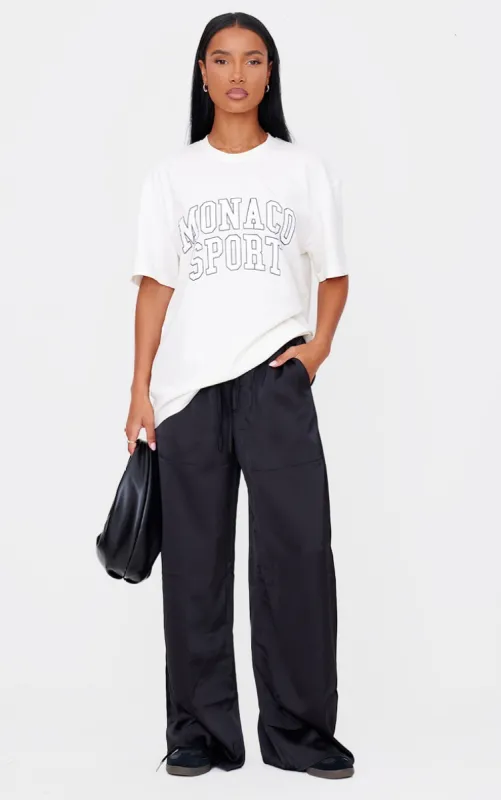 Black Premium Satin Low Rise Wide Leg Drawstring Trousers sold by Pretty Little Thing