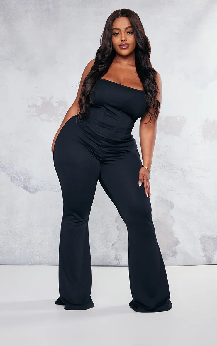 Plus Black Flare Leg High Waisted Trousers sold by Pretty Little Thing