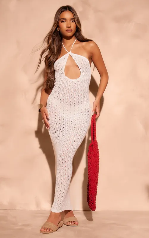 White Pointelle Knit Cut Out Front Halterneck Maxi Dress sold by Pretty Little Thing