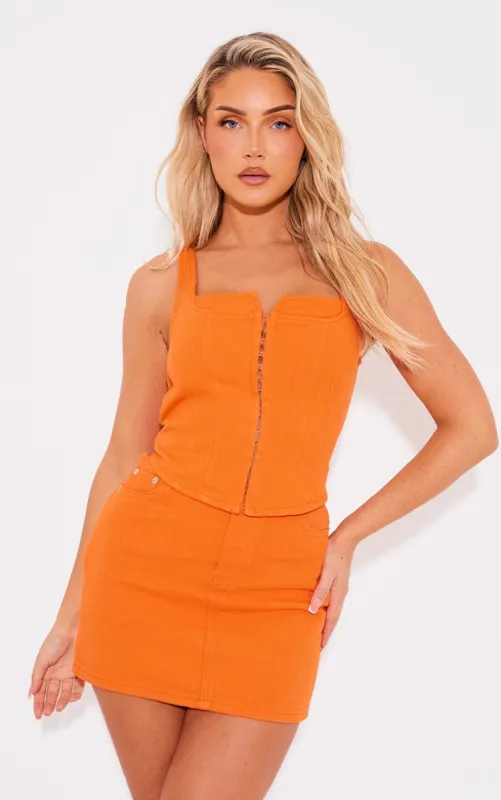 Bright Orange Denim Contrast Stitch Corset Top sold by Pretty Little Thing