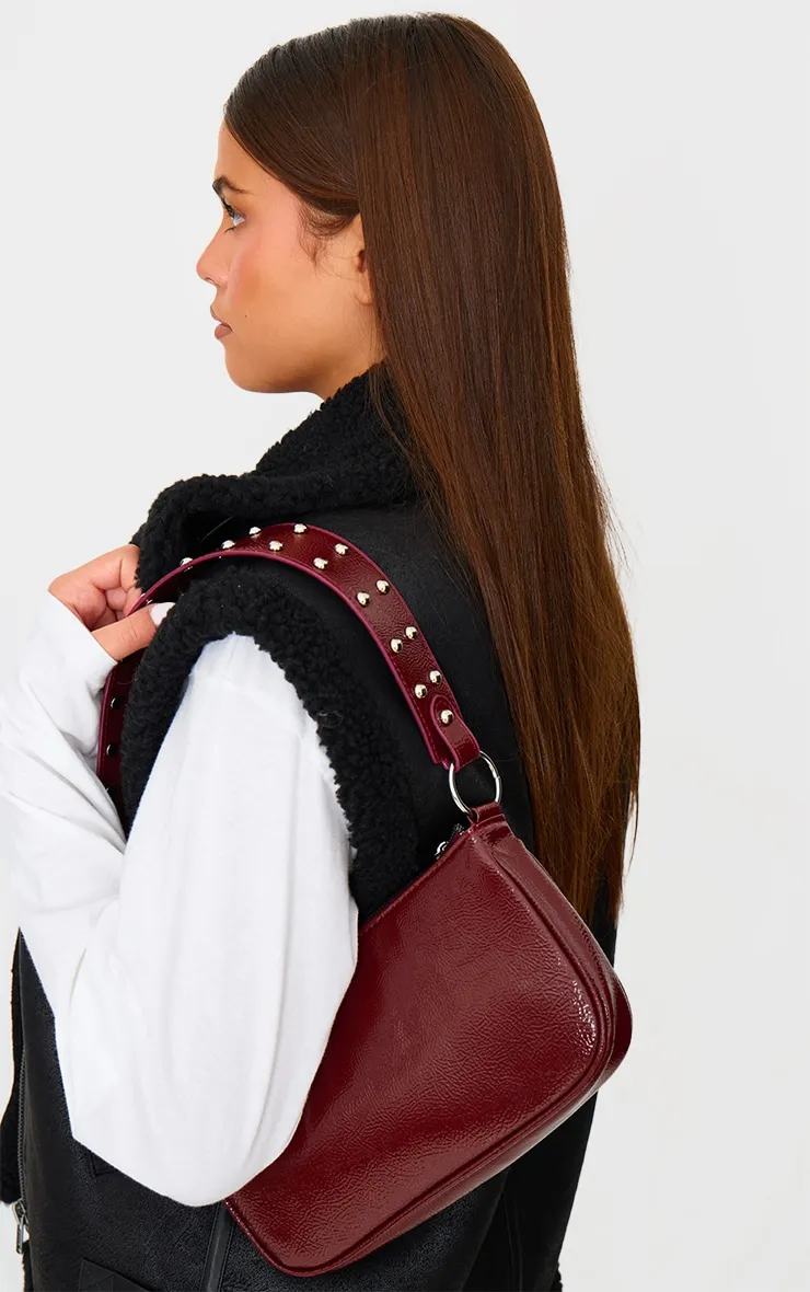 Burgundy Stud Handle Shoulder Bag sold by Pretty Little Thing