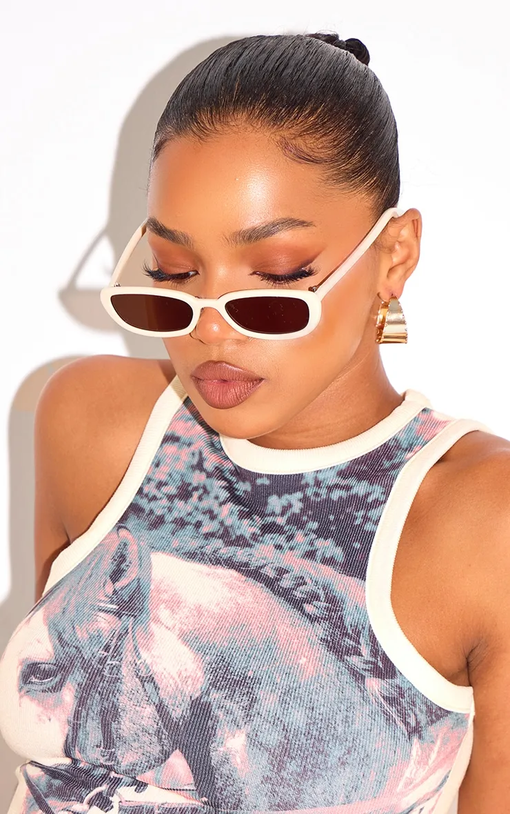 Cream Slim Retro Cat Eye Sunglasses sold by Pretty Little Thing