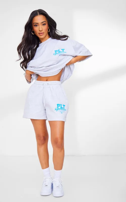 Petite Ash Grey Slogan Runner Shorts sold by Pretty Little Thing