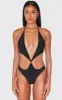 Black Extreme Cut Out Gold Trim Halter Tie Swimsuit sold by Pretty Little Thing