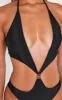 Black Extreme Cut Out Gold Trim Halter Tie Swimsuit sold by Pretty Little Thing