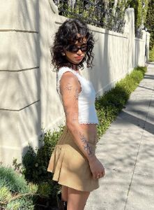 Amira Mini Skirt Beige sold by Princess Polly